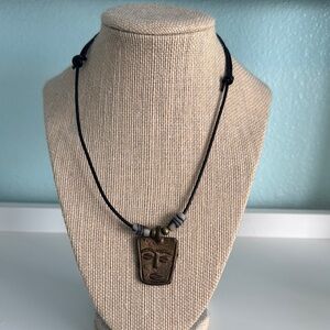 Artisan Bronze Face Pendant Necklace